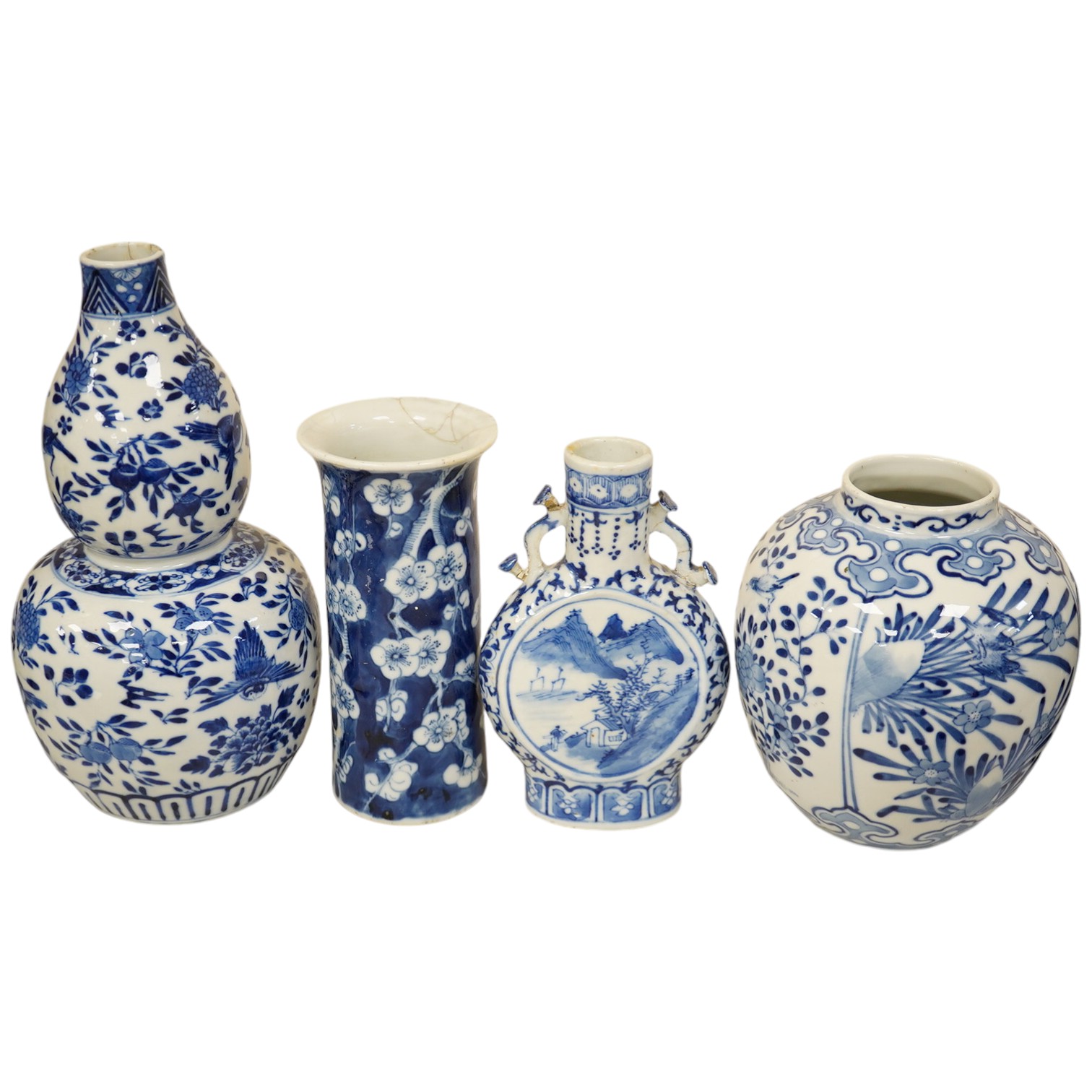 Four 19th century Chinese blue and white jars / vases, including a moon flask and double gourd vase, largest 23cm high. Condition - poor